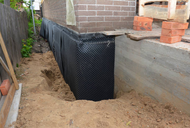 SJ Waterproofing Pros technician performing targeted Sump Pump Installation assessment in Fredonia, NY